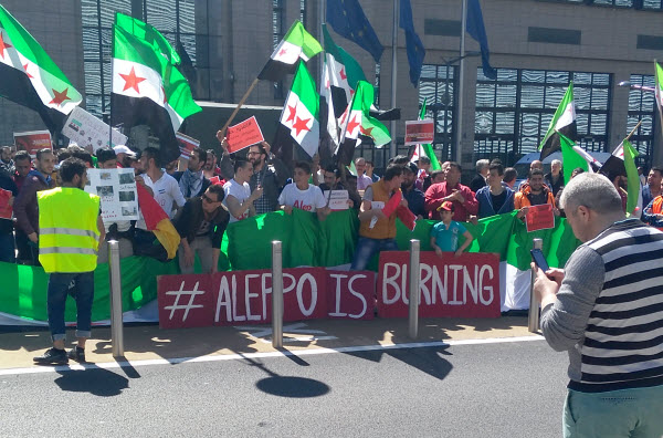 السوريون ببلجيكا يتظاهرون ضد قصف النظام لمدينة حلب 