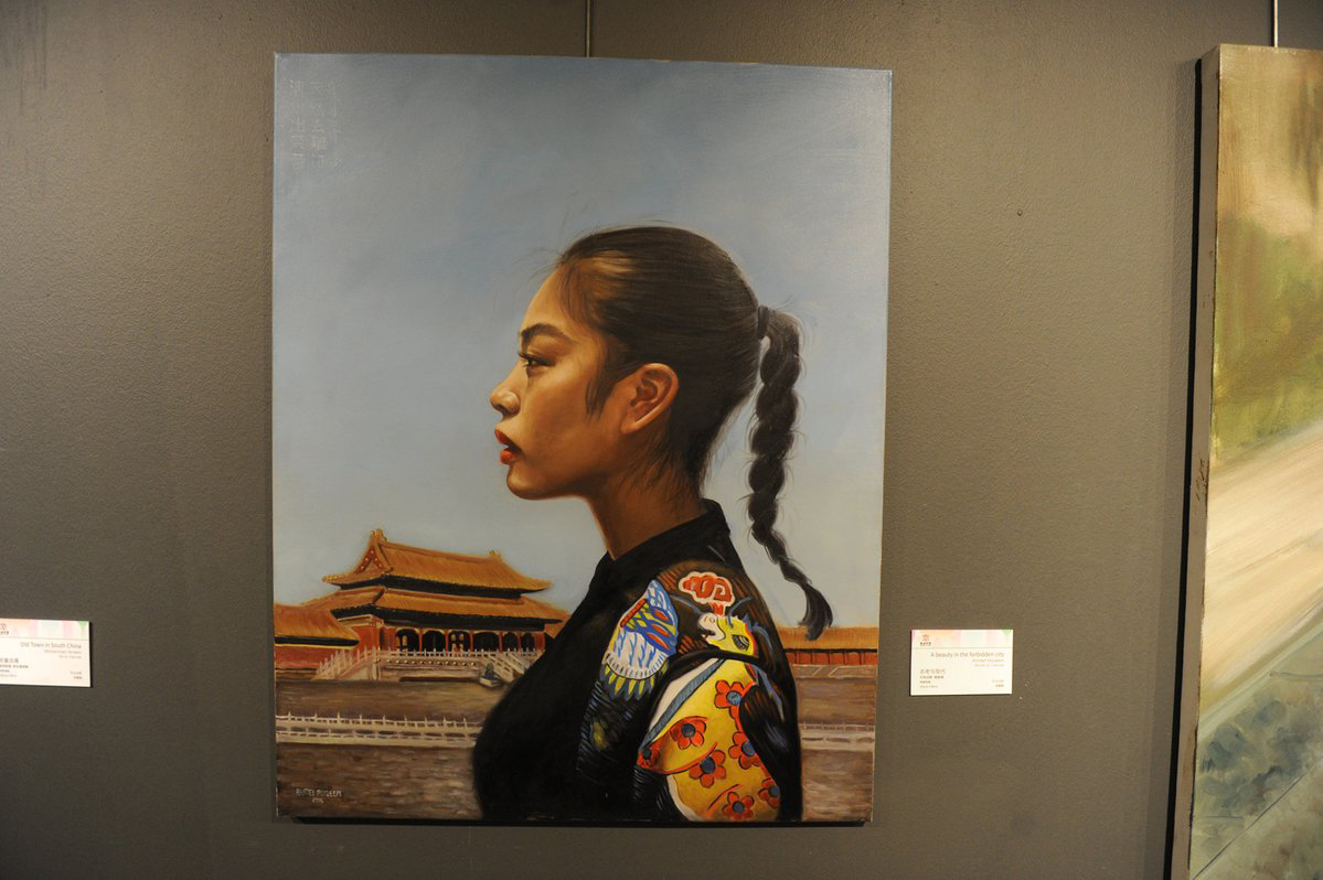 معرض "احساس بروح الصين" يحاكي الثقافة الصينية باعمال فنانين عرب واجانب  