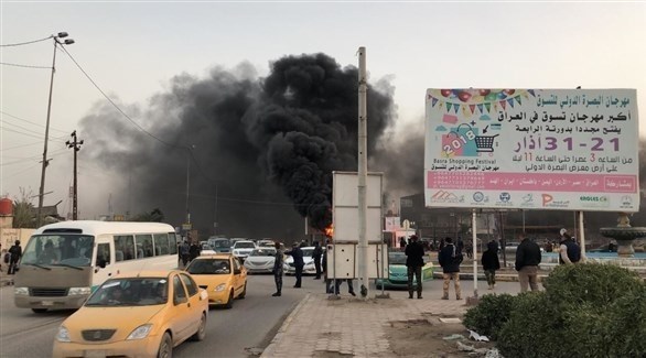 محتجون يحرقون مقراً للشرطة في البصرة