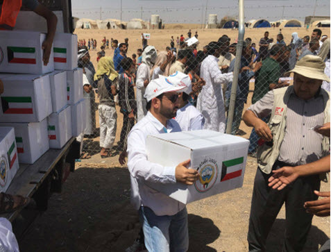 «الهلال الأحمر الكويتي»تقدم 1500 سلة غذائية لنازحين عراقيين بمخيم «الخازر»  