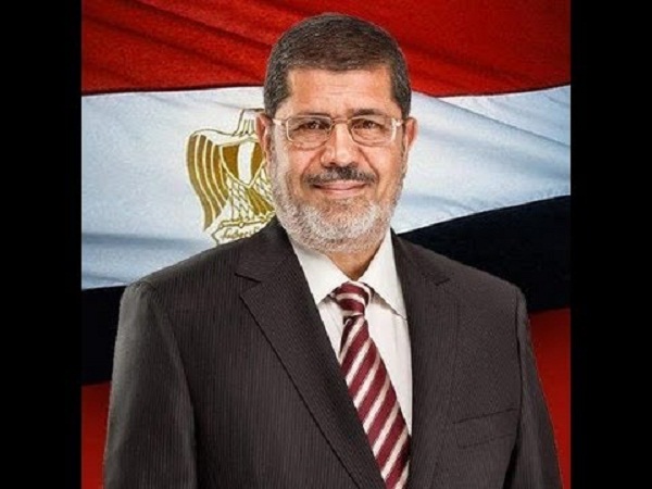 نجل الرئيس المصري السابق مرسي يقول إن والده دفن في القاهرة