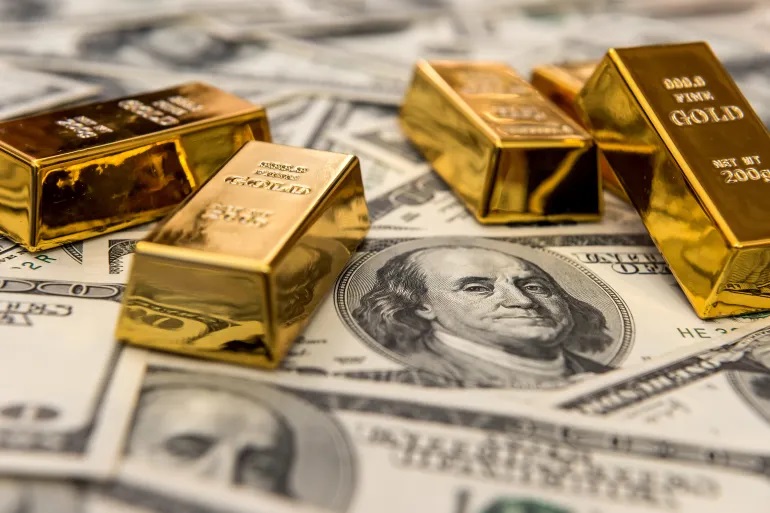  الذهب ينخفض بفعل ارتفاع الدولار